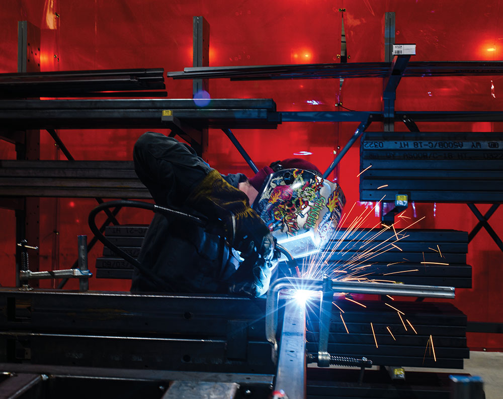 A welder at work at Boreas Campers