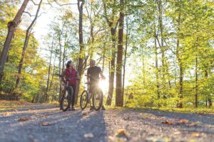Couple cycling on bike trail in Bedford County, PA