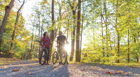 Couple cycling on bike trail in Bedford County, PA