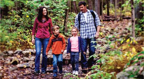Family hiking in Pine Grove Furnace State Park in Pennsylvania