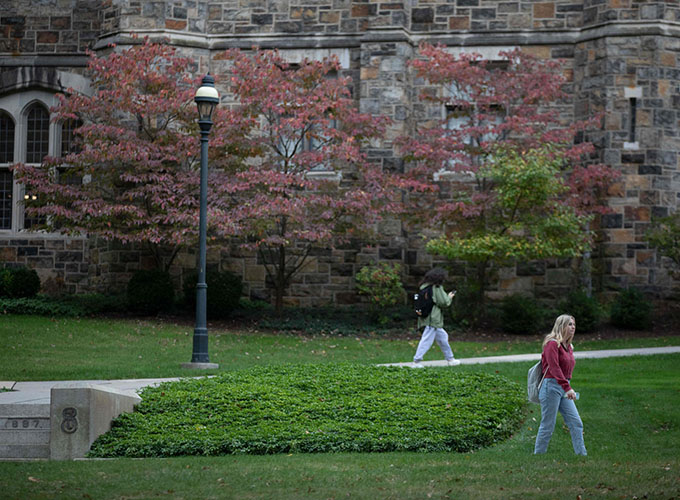 Trees display their fall colors as students walk across campus at Lehigh University in Bethlehem, PA. Excellent education makes Bethlehem one of the best places to live in the U.S.