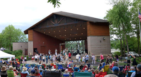 Residents dance to live music at Arts in the Parks in Bloomington, MN. Unrivaled parks are one amenity that makes Blomington one of the best places to live in the U.S.