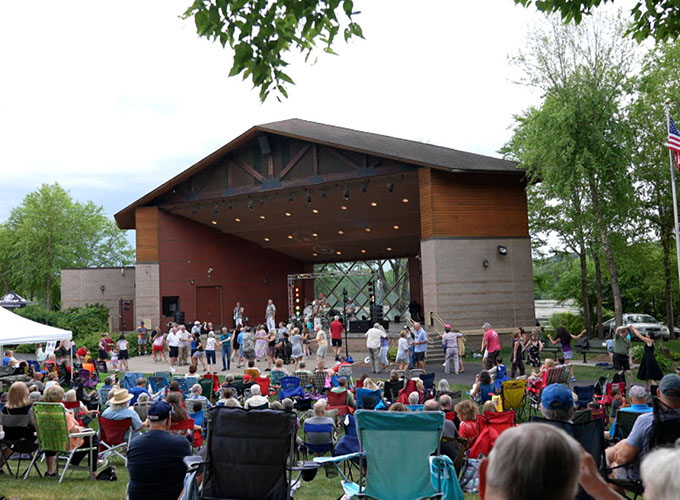 Residents dance to live music at Arts in the Parks in Bloomington, MN. Unrivaled parks are one amenity that makes Blomington one of the best places to live in the U.S.