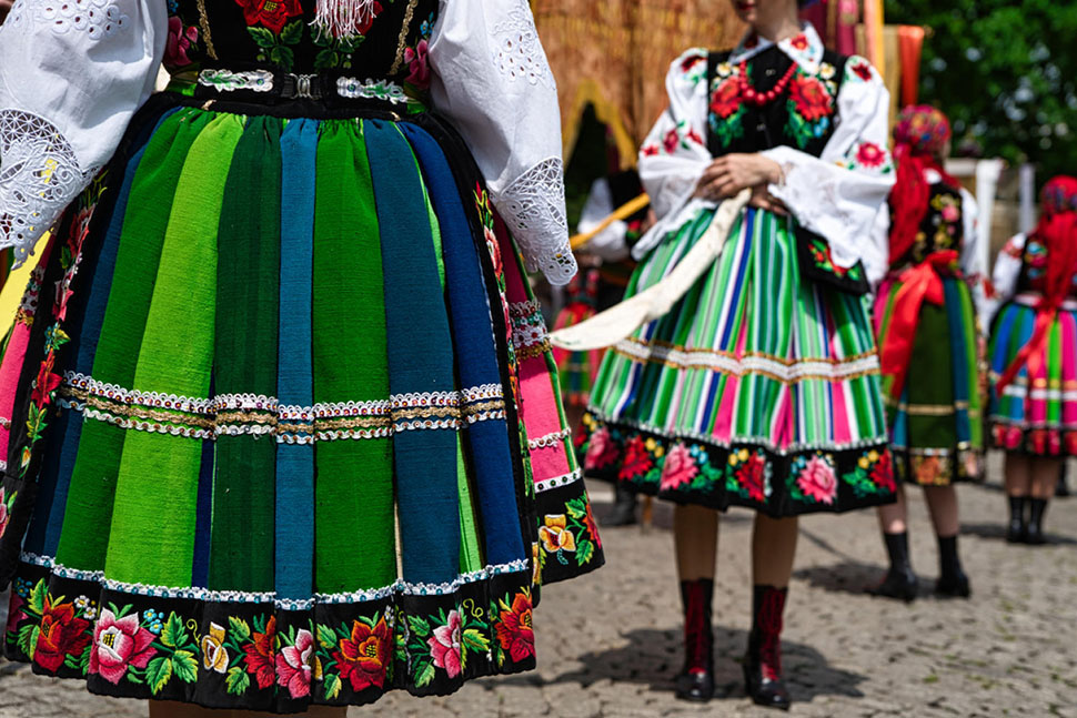 Women wear brightly colored traditional Polish skirts in Cheektowaga, NY, a suburb of Buffalo known for its large Polish-American community.