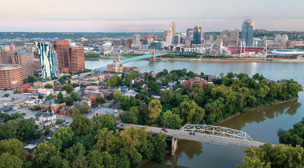 An aerial view of Covington, KY, left, and Cincinnati, OH, across the river. Cincinnati played a vital role in the Underground Railroad, as enslaved people could reach freedom by crossing the river from the southern slave states. Learn more by visiting Cincinnati's National Underground Railroad Freedom Center.