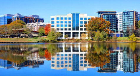 Office buildings along the water in Columbia, MD. Businesses there enjoy a central location between Baltimore and Washington, D.C. and a talent pipeline with highly educated workers.
