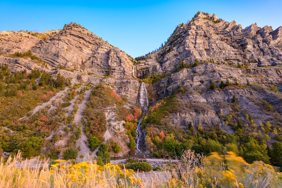 Bridal Veil Falls near Orem, UT, is a popular outdoor destination, especially during the autumn when nearby Provo Canyon is set ablaze with fall colors.