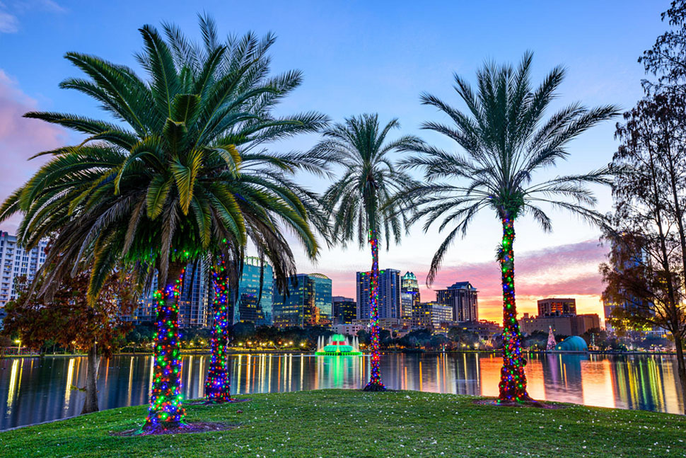 A view of downtown Orlando, FL, at dusk from Lake Eola Park. Orlando is a playground packed with things to do for children and adults, but year-round sunshine, diverse neighborhoods and access to excellent health care also make it one of the best places to live in the U.S.