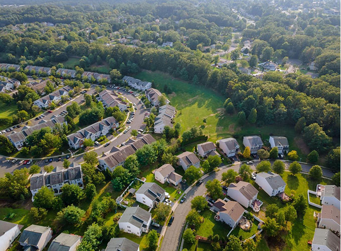 An aerial view of sleepy neighborhoods in Parma, OH. Cleveland's largest suburb established itself as one of the best places to live in the U.S. with its distinctly down-to-earth midwestern authenticity and affordable lifestyle.