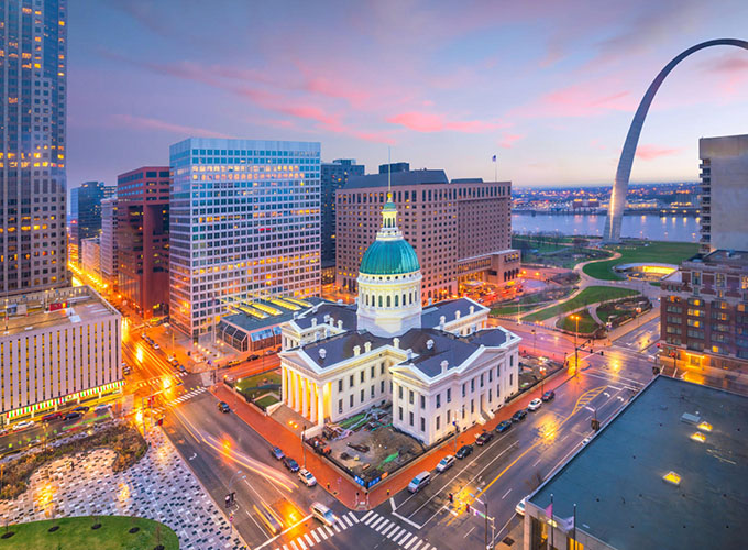 An aerial view of the downtown St. Louis skyline at twilight. A multitude of accessible, free attractions are among the reasons why St. Louis is one of the best places to live in the U.S.