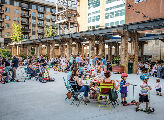 People dine outdoors at the Innovation Quarter in Winston-Salem, N.C., a hub for biomedical research and thriving start-ups. Arts, culture, affordability and a superior quality of life make Winston-Salem one of the best places to live in the U.S.