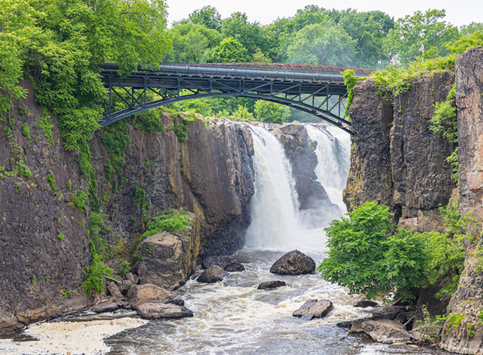 The highlight of a visit to Paterson Great Falls National Historical Park in Clifton, NJ, is a gorgeous view of the waterfall and scenic bridge crossing the gorge.