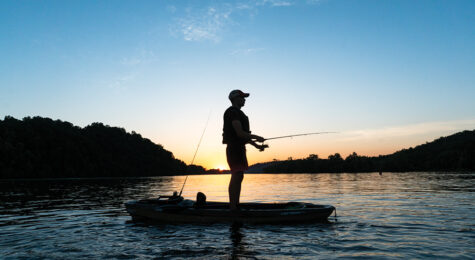 Man kayak fishing at sunset in Cleveland, TN.