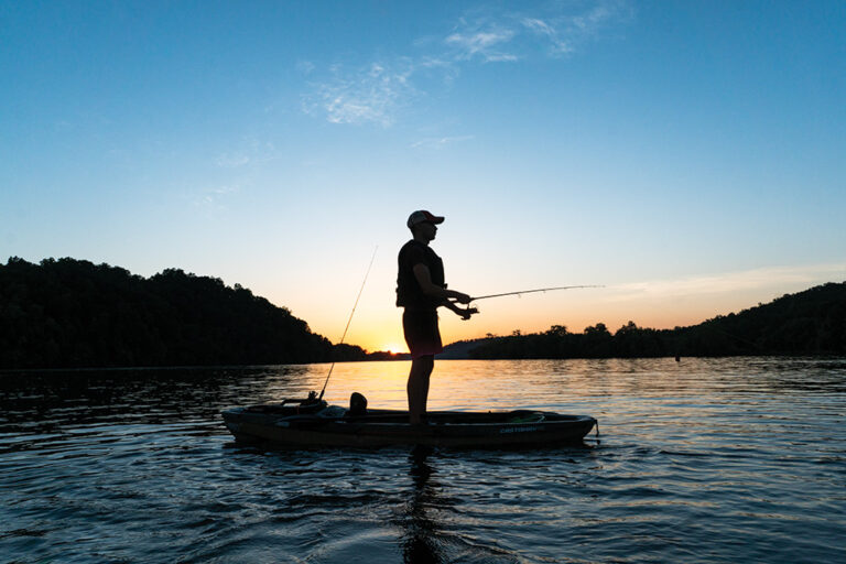 Man kayak fishing at sunset in Cleveland, TN.