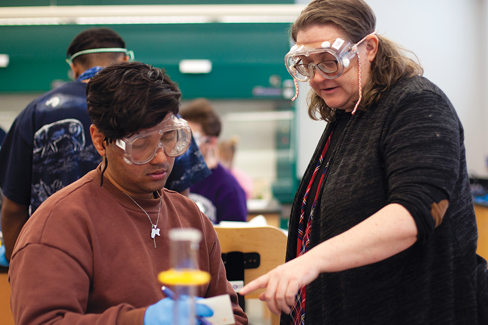 A professor works with a student in a chemistry class at Lawrence University.