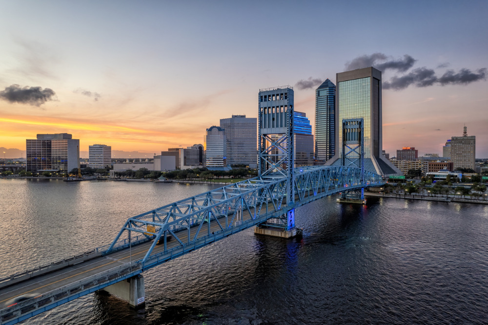 Aerial view of Jacksonville cityscape at dusk