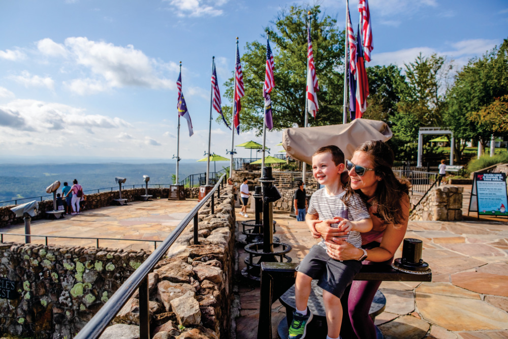 Amanda Barry and her son Everett look out from the top of the Rock City Gardens at Lookout Mountain near Chattanooga.  ©Journal Communications/Nathan Lambrecht