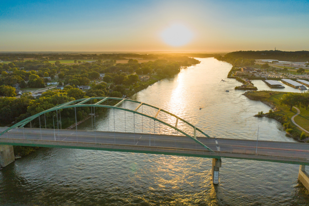 Sunset over Veteran's Memorial Bridge in Sioux City, IA, over the Missouri River. Sioux City is one of the best places to live in Iowa.