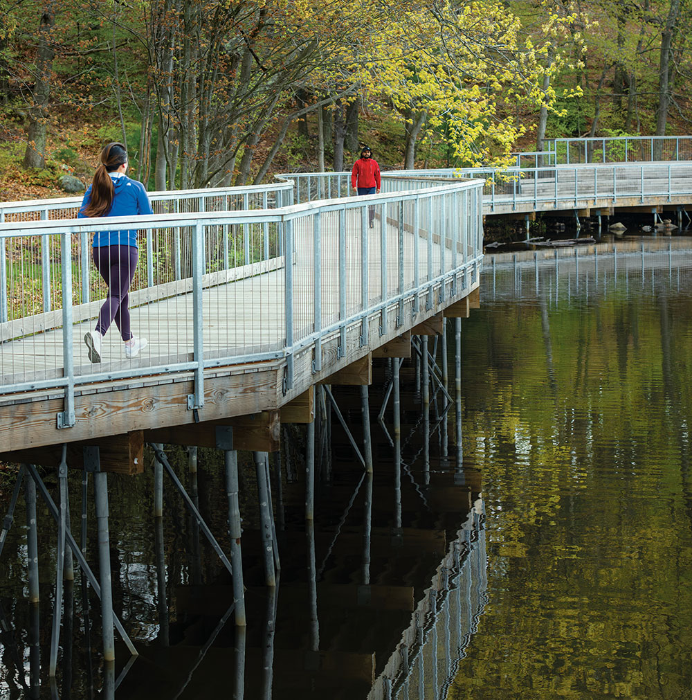 Visitors at Coes Reservoir Boardwalk enjoy a morning stroll.