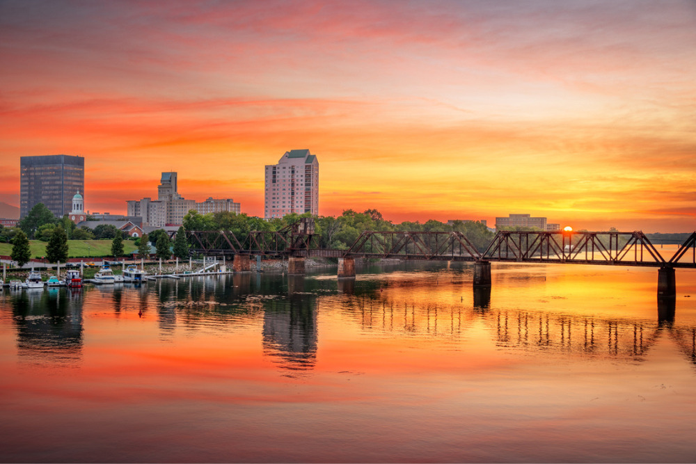 Augusta, GA, USA downtown skyline on the Savannah River at sunset. Augusta is one of the best places to live in Georgia.