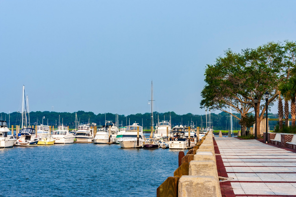 A sidewalk runs along a lakefront park next to a marina in Beaufort, S.C., one of South Carolina's best cities. 