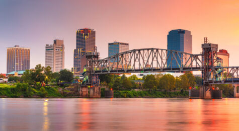 The city skyline overlooks the river in Little Rock, Arkansas.