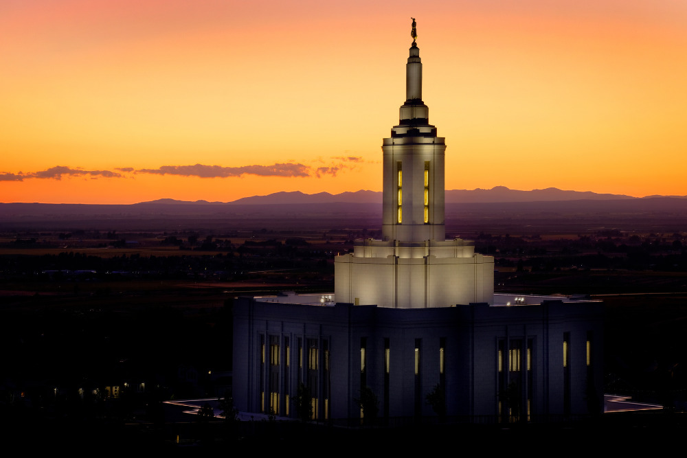 Mormon Latter-day Saints Temple with lights at sunset in Pocatello, Idaho.