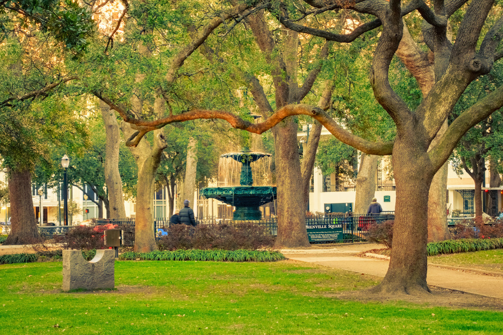 A photo of Bienville Square, a historic city park with an old ornate fountain in downtown Mobile, Alabama.
