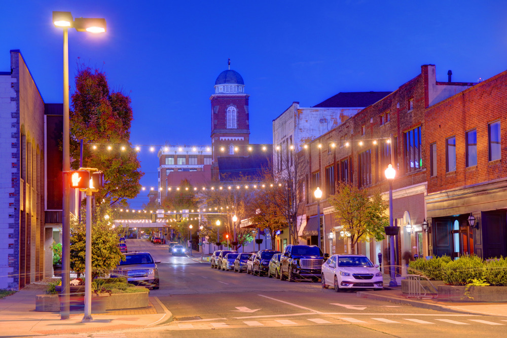 String lights hang across the streets in downtown Parkersburg, West Virginia. Parkersburg is a top city to live in West Virginia.