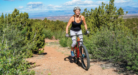 Girl mountain biking in Santa Fe County