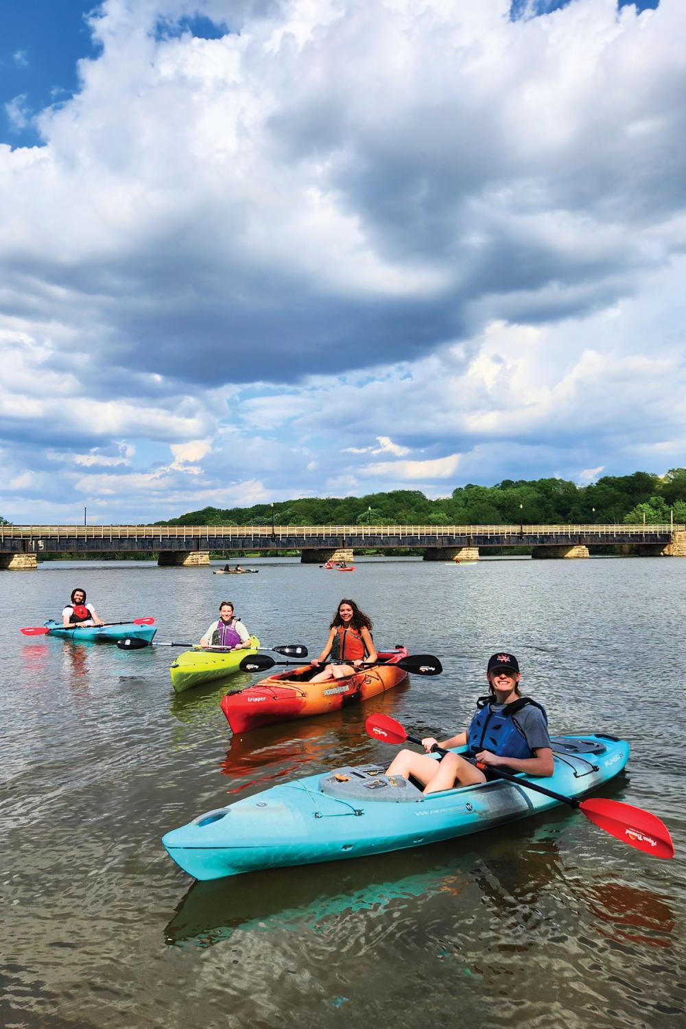 Kayakers on the Cedar River in Iowa.
