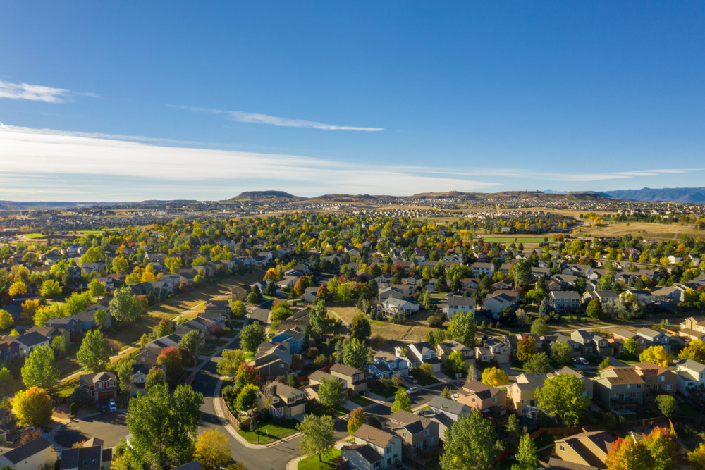 An aerial drone image shows the small town of Castle Rock, Colorado, right outside of Denver. Castle Rock is one of the best places to live in Colorado.