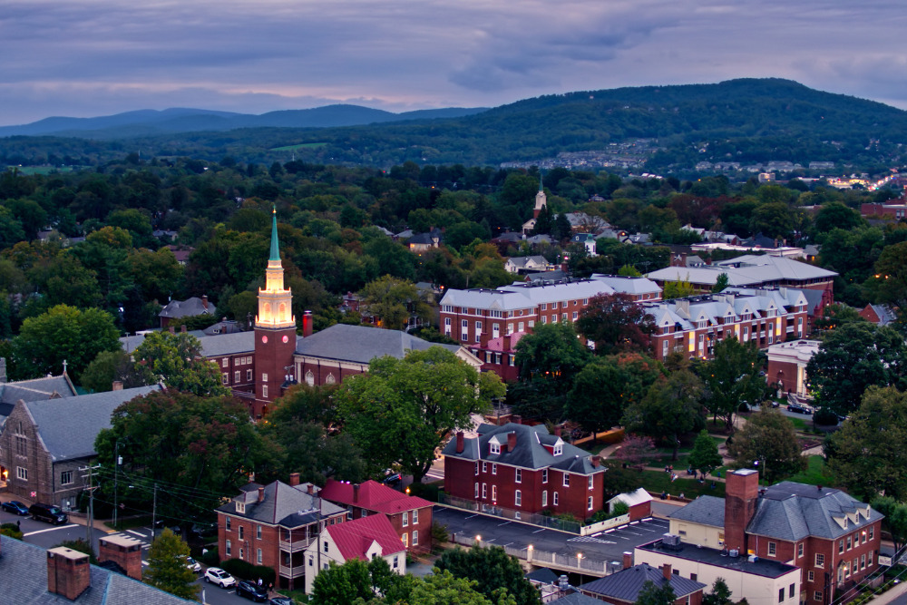 A high aerial shot of downtown Charlottesville, Virginia. Charlottesville is one of the best places to live in Virginia.