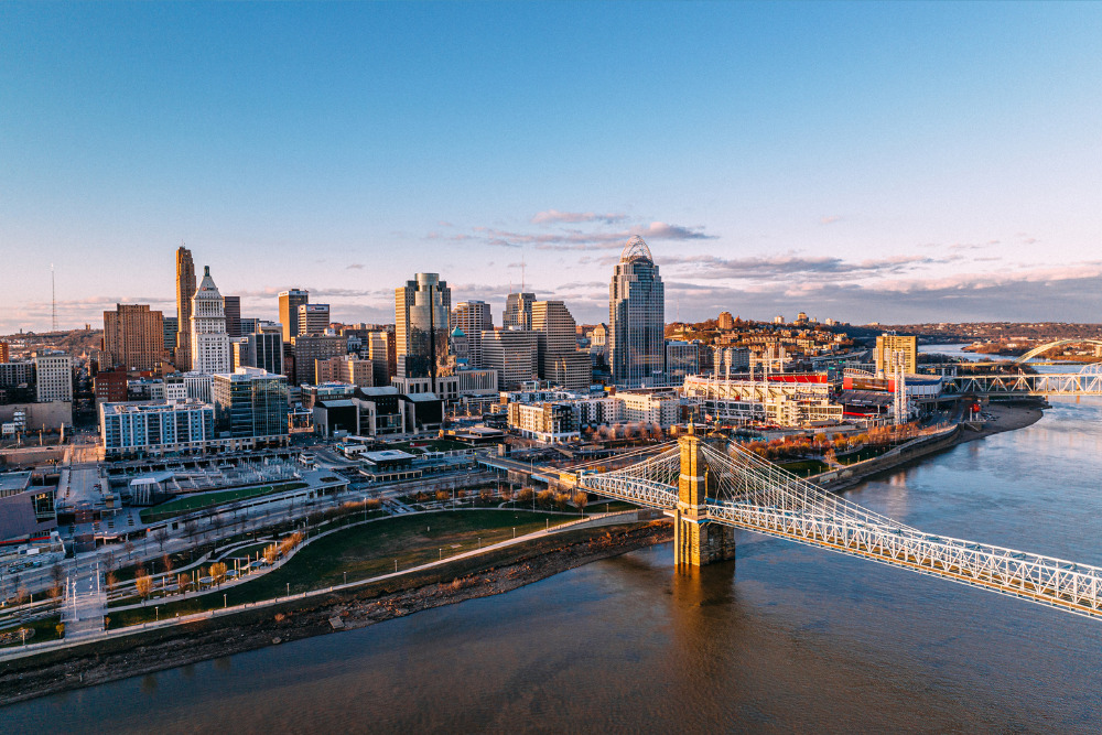 Downtown Cincinnati at Sunset and the Smale Riverfront Park along the Ohio River.