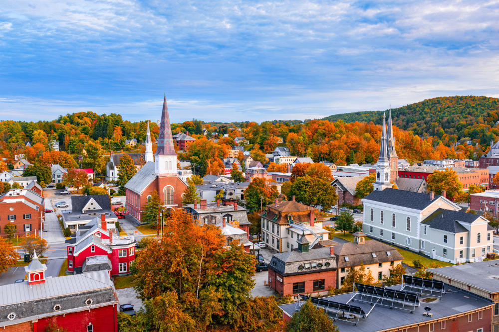 Church steeples punctuate a view of fall colors in Montpelier, Vermont.