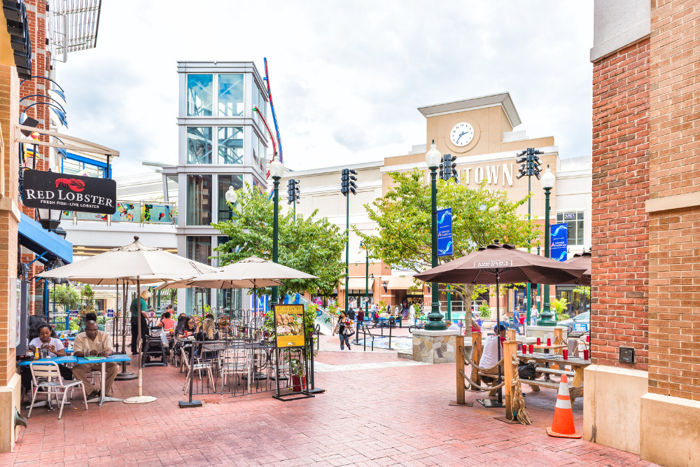 The downtown area of Silver Spring, Maryland, with a shopping mall, restaurants, and shops.