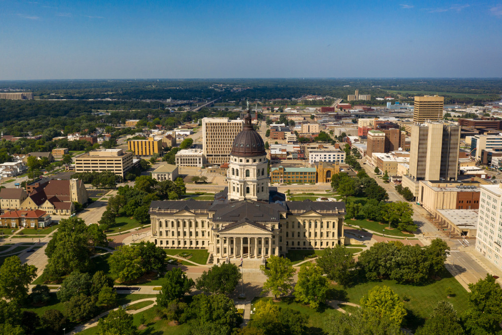 A view of the state capitol building with its copper dome in downtown Topeka, Kansas. 