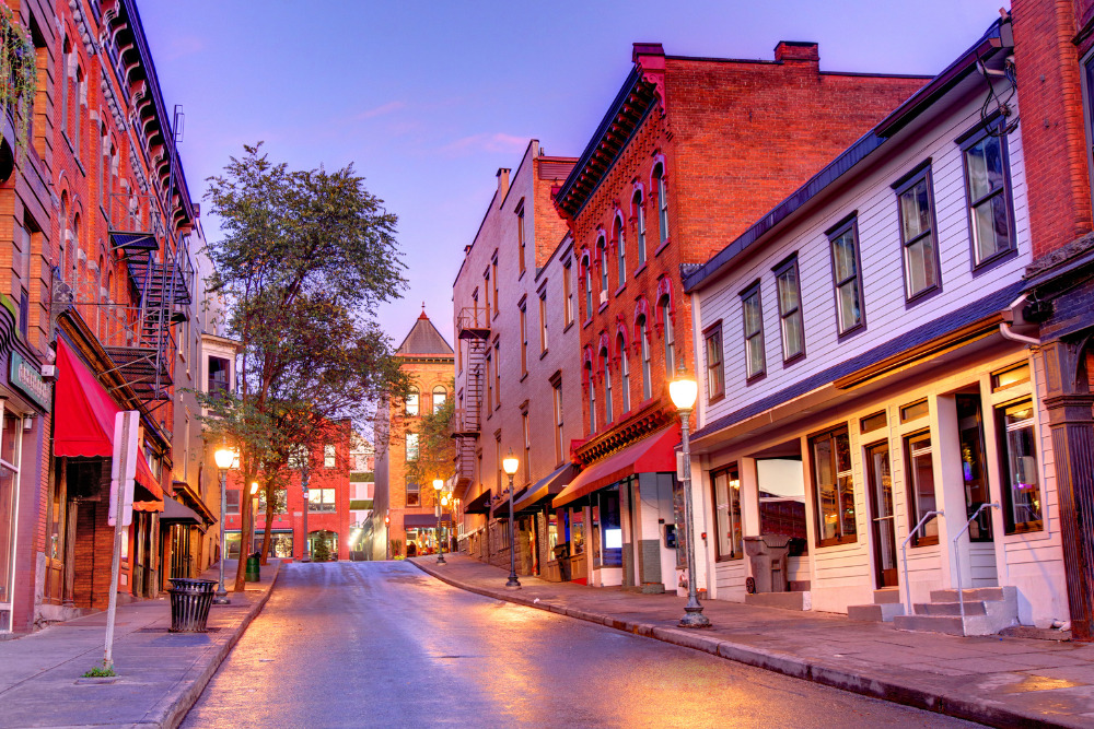 A deserted street in Saratoga Springs, New York, at dawn. Saratoga Springs is a popular resort city thanks to its mineral springs and also is a great place to live.