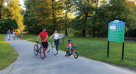 Family bikes along the Neuse River in the Triangle East Region of North Carolina.