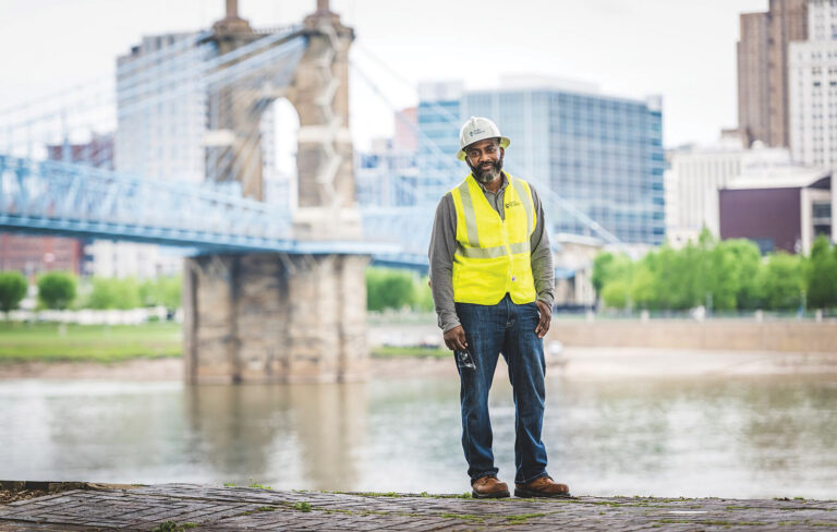 Duke Energy worker standing by river