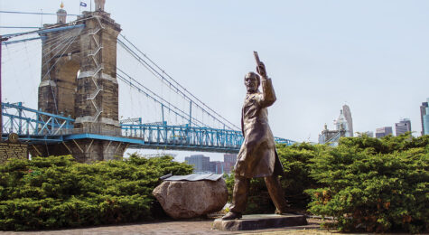 Roebling Bridge and statue on riverfront