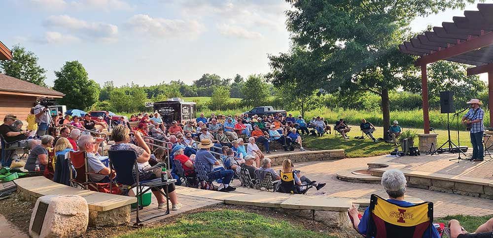 Families take in music at the Leonard Grimes Memorial Amphitheater.