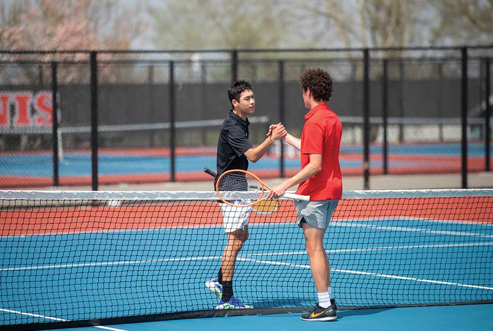 Students compete in the IHSAA Distirict Tennis Tournament the Marshalltown Roundhouse at Marshalltown High School in Marsahlltown, Iowa. ©Journal Communications/Jeff Adkins