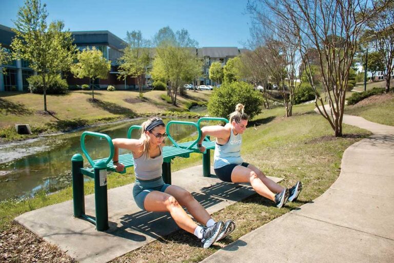 Two people get in a workout on one of the many trails in Jackson, Tennessee.
