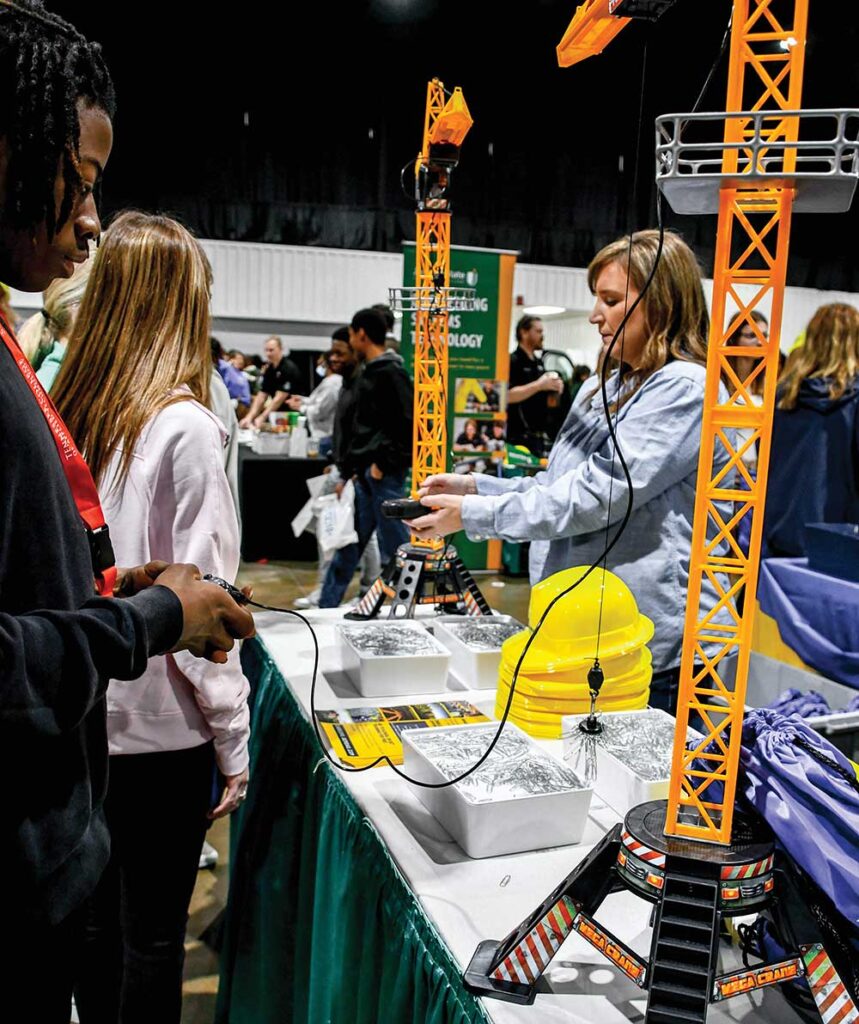 The Pathways2Possibilities (P2P) career expo plays a crucial role in introducing eighth-grade students to a wide array of regional career paths, igniting their passions and encouraging exploration.