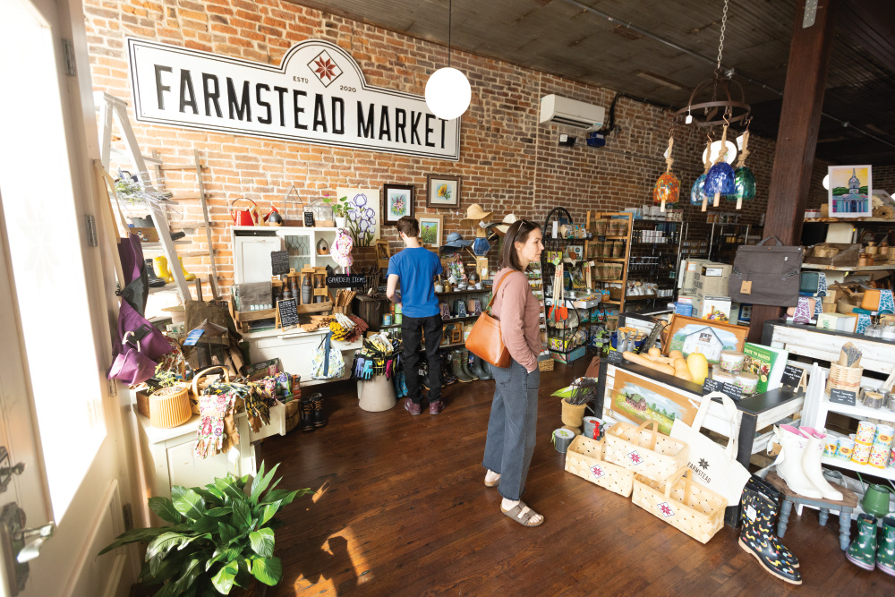 Visitors shop at Farmstead Community Market in downtown Columbia, TN