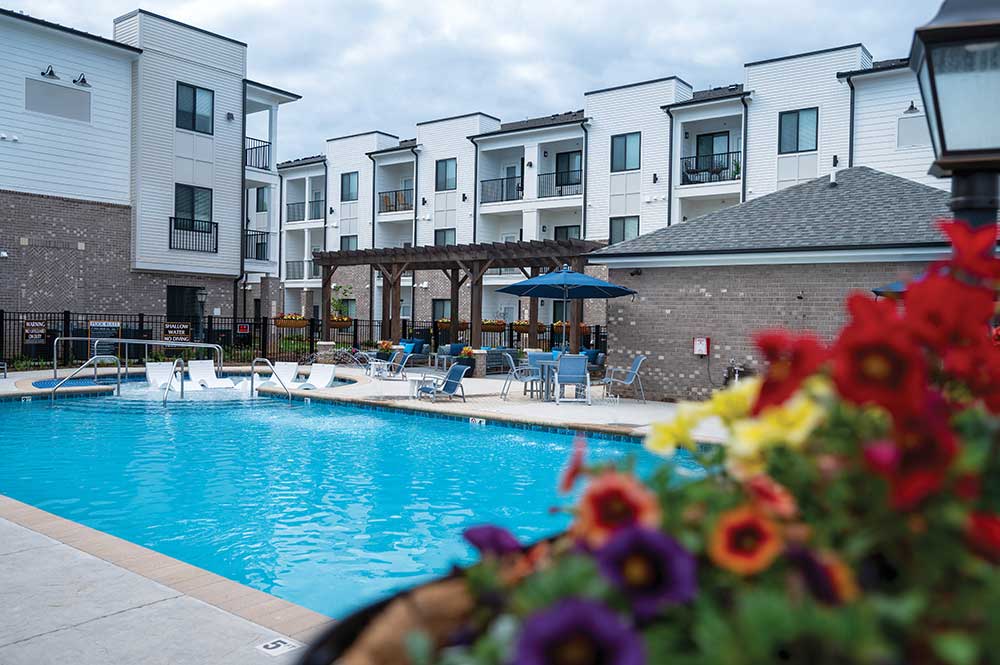 Photo of the pool and exterior at Main Street Lofts in Oak Ridge, TN.