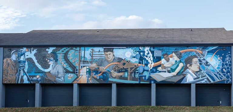 The "Together, We Thrive" mural by artist Megan Lingerfelt decorates the side of the United Way Building in Oak Ridge, Tennessee.