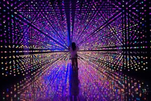 Discover the vibrant art scene of San Antonio after dark. Explore immersive installations at Hopscotch, catch a concert at the historic Stable Hall and witness the captivating light show, The Saga.