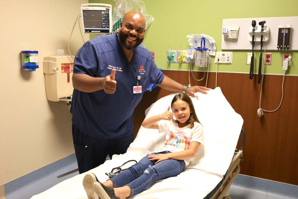 a pediatric patient and staff member